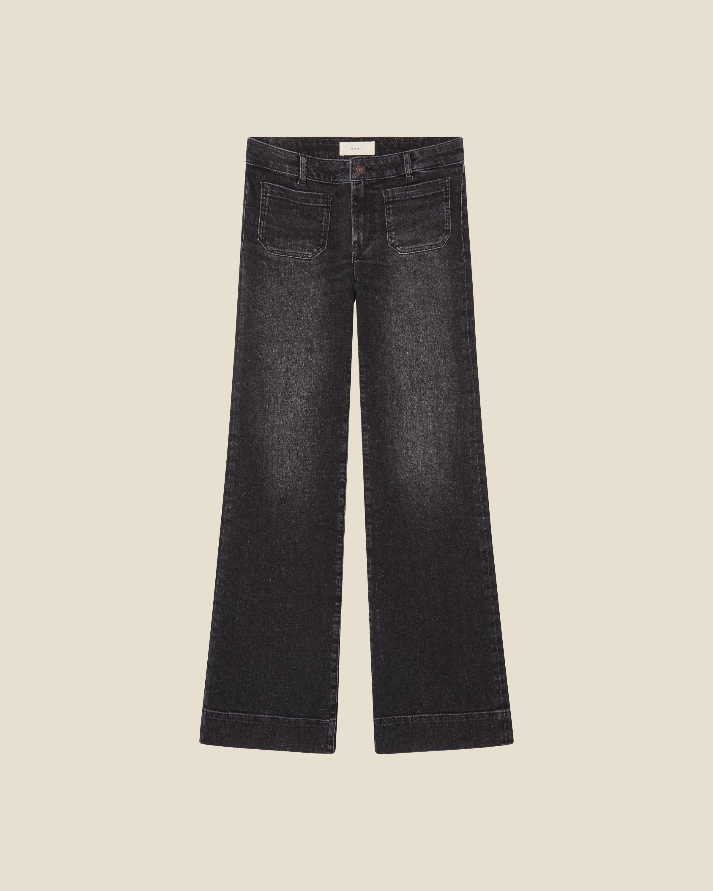 St Monica Low Washed Black flat (beige background)